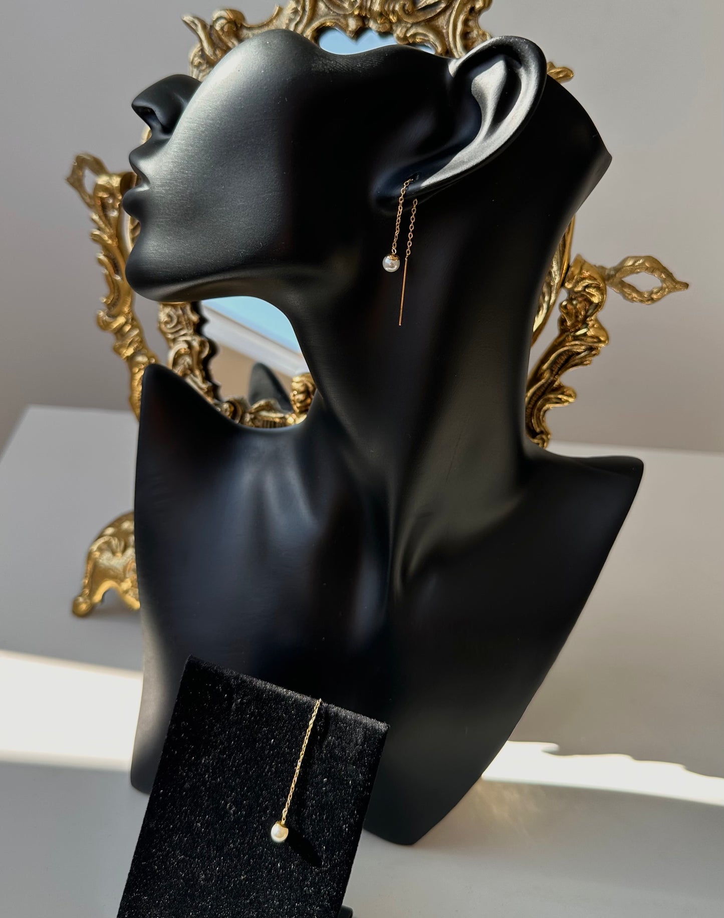 Boucle d’oreille pendantes perle