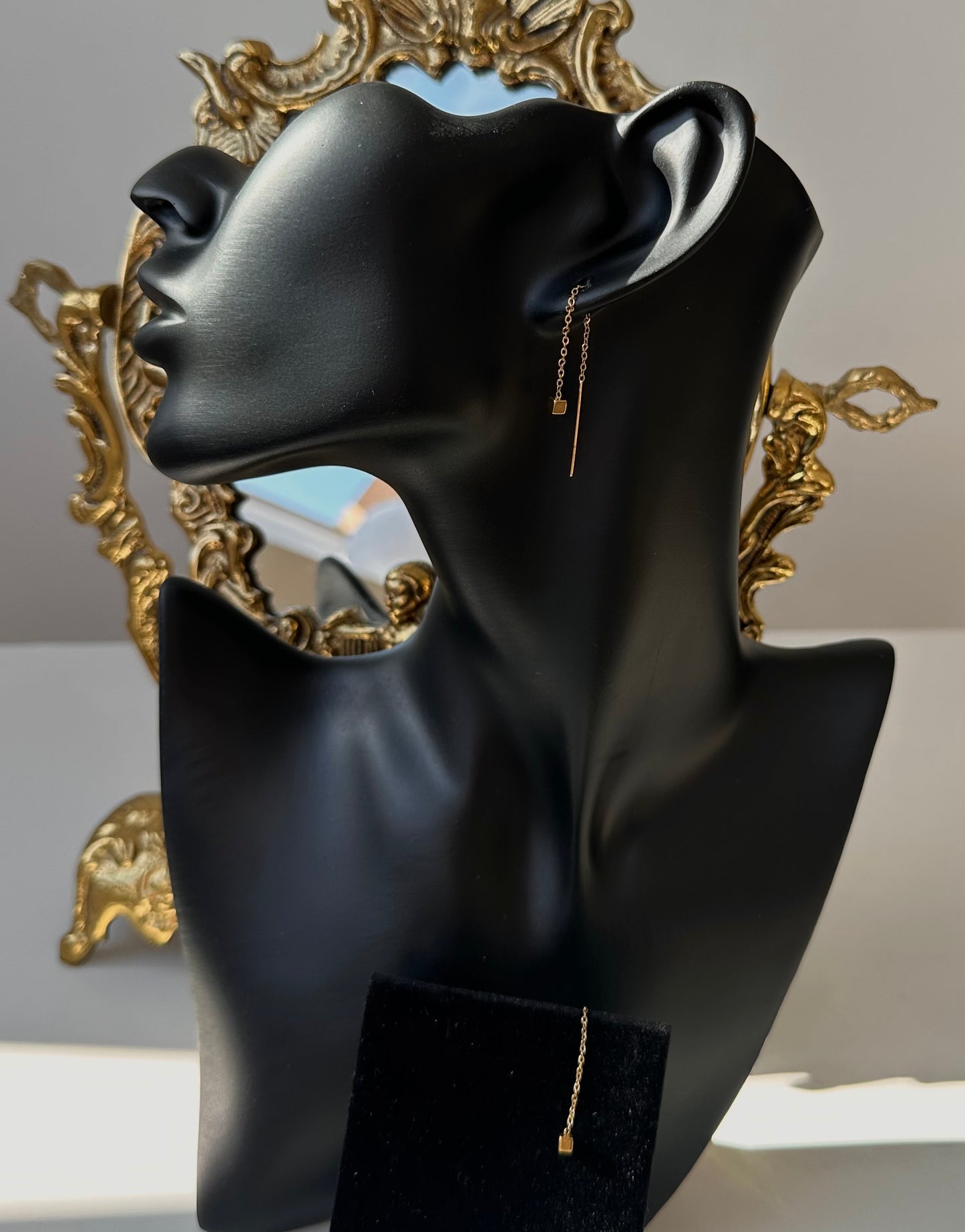 Boucle d’oreille pendantes carré